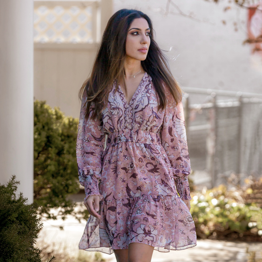 A Woman in Pink Floral Dress