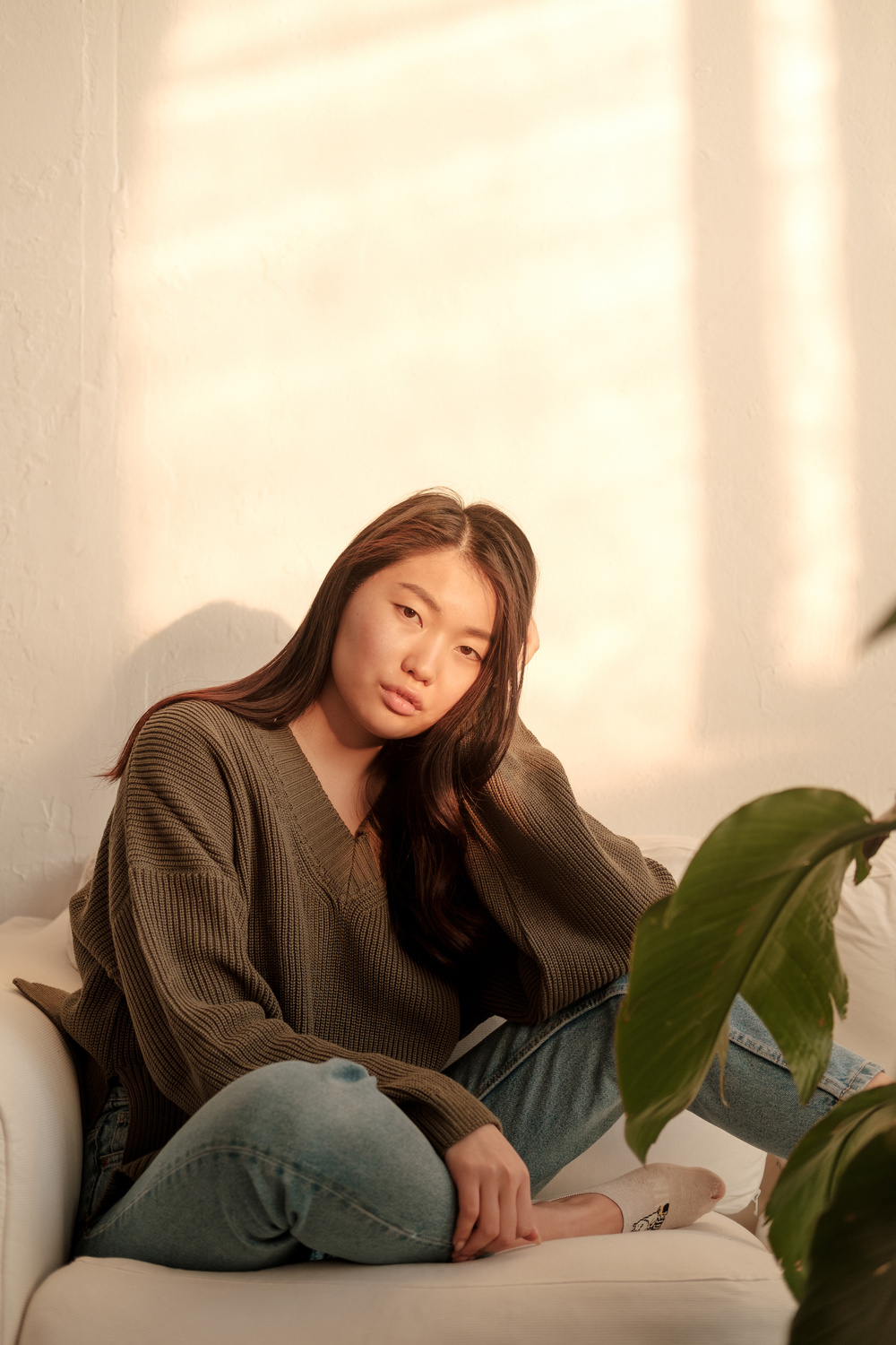 Woman Sitting Alone on the Couch